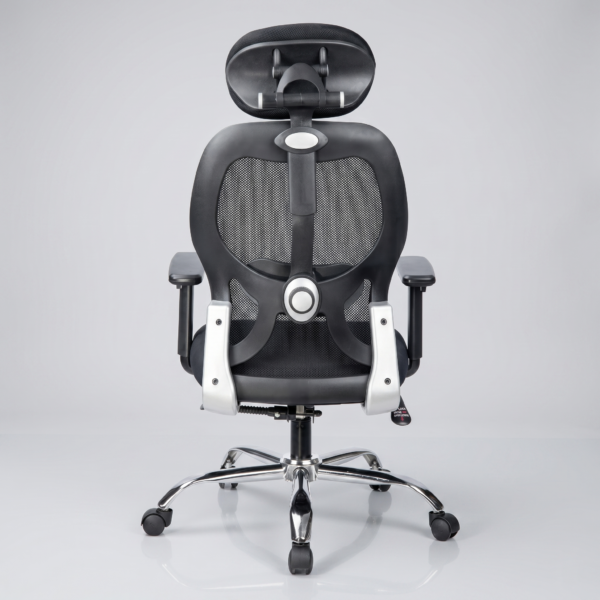 C138 Matrix high-back ergonomic office chair in black mesh with chrome base and adjustable headrest.