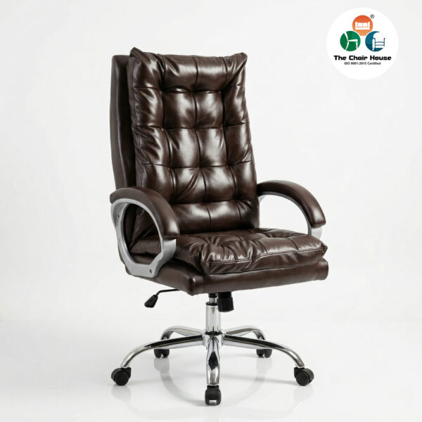 Close-up texture shot of deep diamond-tufted brown leather cushioning on a high back office chair.
